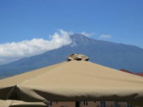 Отель Boulevard Inn Mt Meru  Аруша